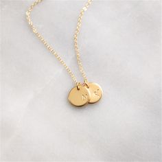 This classic gold necklace is perfect for everyday! An initial is hand stamped on a petite charm just for you. A wonderful gift for yourself, sister, best friend and anyone special in your life. Choose 1-4 charms in silver, rose or gold options! •Thick 10mm disc•Choose up to 4 discs•100% 14kt Gold-Filled, Sterling Silver, or Rose Gold-Filled.•Stamped by hand with your choice of initial•See our chart for available symbols•Satin finish Water friendly Dainty Initial Necklace, Sister Best Friend, Personalized Gifts For Her, Custom Initials, Classic Gold, Initial Charm, Personalized Necklace, 14kt Gold, Initial Necklace