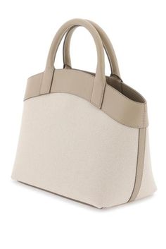 Find SAVETTE Small Round Canvas Tote Bag on Editorialist. The SAVETTE small round tote bag is crafted from cotton canvas with a distinctive silver metal Tondo button and leather finishes. It features a magnetic closure, twill interior with a zip pocket, and double top handles. Designer Beige Top Handle Canvas Bag, Designer Cream Canvas Shoulder Bag, Beige Leather Top Handle Canvas Bag, Beige Canvas Bag With Leather Trim And Top Handle, Designer Beige Canvas Bag With Leather Handles, Beige Canvas Top Handle Bag With Leather Trim, Beige Top Handle Canvas Bag With Leather Trim, Luxury Beige Canvas Bag With Handles, Cream Shoulder Bag With Leather Trim And Top Handle