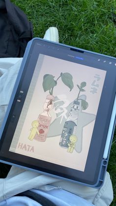 a person is holding an electronic device with pictures on it in their lap, and there are two plants growing out of bottles