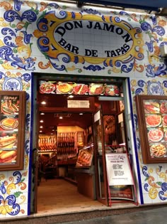 the front entrance to don jamoy bar detatap with colorful tiles on it