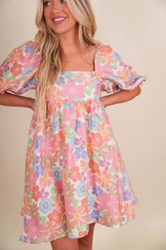 Feel as pretty as a flower in our Amelia Floral Dress. This mini dress features short, puff sleeves and a beautiful floral print. With a cute smocked design and mini ruffle detail, it's perfect for a casual yet lovely look. Fully Lined 100% Polyester Washing Instructions: Dry clean for best results Spring Teacher Outfits, Casual Preppy Outfits, Spread Kindness, Cute Summer Dresses, Puffy Sleeves, Dress Gift, Really Cute Outfits, Cute Simple Outfits, Dance Dresses