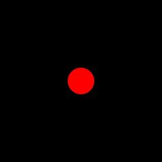 a red dot on a black background