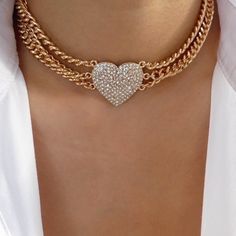 Attached layers, includes everything pictured Material: gold plated brass, crystals Length: 13" + 3" extension Pendant size: 1.1" x 1" IMPORTED Luxury Heart Shaped Necklace With Heart Beads, Valentine's Day Gold Rhinestone Jewelry, Gold Double Heart Crystal Jewelry, Heart Choker, Crystal Heart, Choker, Gold Plate, Plating, Brass