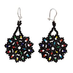 Mexican artisan Adriana Trejo uses black and multicolored petite glass beads to diligently handcraft two stars that dangle from the ears with elegance. Hanging from hooks of sterling silver these earrings add a sophisticated touch to your wardrobe. Beadwork Tutorial, Beaded Headband, Beaded Earrings Patterns, Beaded Jewelry Patterns, Beaded Dangle Earrings, Earring Patterns, Seed Bead Earrings, Stunning Earrings, Glass Bead Necklace