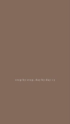 a brown background with the words step by step day by day written in white on it