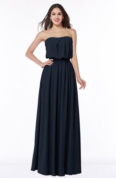 a woman in a strapless black dress