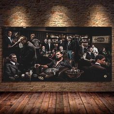 a group of people sitting in front of a brick wall with an image of them on it