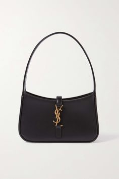 While subtly nodding to '00s baguette shapes, SAINT LAURENT's mini bag is timeless. It's been made in Italy from leather and embellished with the classic 'YSL' monogram at the front that functions as the fastening. Ysl Purse, Classy Purses, Luxury Bags Collection, Girly Bags, Classic Handbags, Classic Bags, Pretty Bags, Mein Style, Black Shoulder Bag