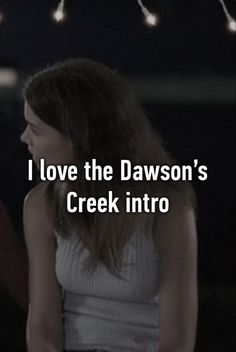 a woman sitting in front of a window with the words i love the dawson's creek into