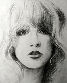 a pencil drawing of a woman's face