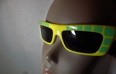 1970s Vintage Mod Sunglasses Yellow Green Frame Made in Italy Funky, vintage sunglasses. Bright yellow frames with green squares. Cool, Mod look. Squared ends. Dark lenses. Retro Green Sunglasses For Parties, Retro Green Sunglasses For Party, Retro Green Plastic Sunglasses, Vintage Rectangular Sunglasses For Spring, Retro Yellow Plastic Sunglasses, Yellow Retro Plastic Sunglasses, Retro Yellow Sunglasses With Mirrored Lenses, Retro Yellow Sunglasses With Uv Protection, Retro Yellow Sunglasses For Spring