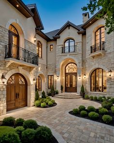 a large house with stone and brick exterior