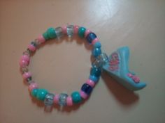 A OOAK blue and pink handmade doll shoe Kandi bracelet. Great for Rave, Decora, Fairy Kei, or Scene fashion. Bracelets Kandi, Wedge Shoe, Pink Wedges, Kandi Bracelets, Scene Fashion, Doll Shoes, Blue And Pink, Dolls Handmade, Wedge Shoes