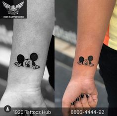 two tattoos that look like mickey and minnie mouses on both wrist, one is black and white