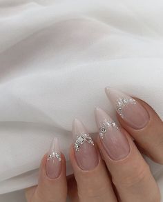 Glazed Nails With Pearls, Nails Acrylic For Bride, Ring Stone Nails, Pearl Placement On Nails, White Glitter French Tip Nails Almond, French Tip Diamond Nails, Gemmed Nails, Neutral New Years Nails, Nail Gem Placement