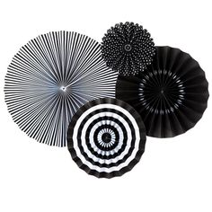 three black and white paper fans on a white background