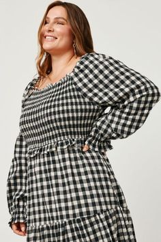 Available in sizes XL through 3XL Black and white gingham print Long sleeves with elastic at cuff Square neckline Subtle ruffle details Tiered skirt Elastic waist 100% Cotton Model is wearing size XL Size chart listed in photos Square Neck Long Sleeve, Black And White Gingham, Smocked Top, Sleeve Maxi Dress, Gingham Dress, Gingham Print, Long Sleeve Maxi, Tier Skirt, Tiered Skirt