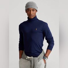 Soft Cotton Turtleneck Fall/Winter - 2023/2024 Classic Navy Tops For Winter, Classic Navy Top For Winter, Blue Cotton Turtleneck Top, Navy Casual Turtleneck Top, Casual Navy Turtleneck Top, Classic Blue Turtleneck Top, Classic Blue Winter Top, Navy Turtleneck Tops For Winter, Navy Turtleneck Winter Top