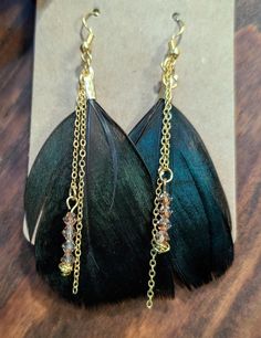 Handmade pheasant feather earrings Pheasant Feather, Pheasant Feathers, San Antonio Tx, Feather Earrings, Pheasant, San Antonio, Halloween Shopping, Favorite Jewelry, Jewelry Earrings Dangle