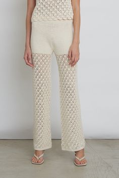 The Rebecca Pant is a pull-on, dressy, yet relaxed pant with a high-waist, lean-fit hip, and then a straight, leg proportion. The pant is hand crocheted in a modern, graphic, crochet stitch and then a denser stitch at the top of pants for coverage. Rebecca pant styles back to the matching Sarah Top for a head-to-toe 70 Crochet Pant, Graphic Crochet, Crochet Pants, Bohemian Aesthetic, How To Hem Pants, Crochet Crop Top, Crochet Stitch, 70s Inspired, Knit Set