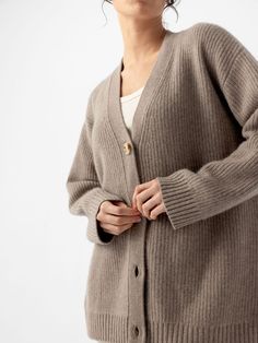 Experience modern luxury with our Sunday Oversized Cashmere Cardigan. Made from 100% cashmere, this ribbed cardigan wraps you in refined comfort and elegance. With an oversized fit, perfect for all-season layering, our cashmere cardigan is versatile enough to be dressed up or down. Due to the inherent quality of the natural fibers, you may notice slight shedding. Women's Oversized Sunday Cashmere Cardigan in Black (Size: X-Small) - Cozy Earth Classic Ribbed Cashmere Outerwear, Oversized Cashmere Sweater For Daywear, Elegant Cashmere Cardigan With Relaxed Fit, Ribbed Merino Wool Cardigan, Oversized Cashmere Cardigan For Daywear, Oversized V-neck Cashmere Cardigan, Classic Oversized Cashmere Cardigan, Oversized Classic Cashmere Cardigan, Oversized Cashmere Sweater Coat For Loungewear