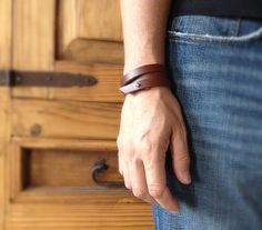 "A staple in your everyday look, this brown leather bracelet forms as a triple wrap leather cuff. A great piece that can be worn every day and is the perfect addition to your bohemian look. It's awesome for stacking and layering with other bracelets. It also comes in black! {LISTING FEATURES} ~ Exotic bohemian style ~ Masculine look ~ Genuine brown leather ~ Stackable with my other men's bracelets ~ Choose from brown or black leather ~ Can be made to order in your size ~ Complimentary gift wrapp Bracelet Boyfriend, Leather Wrist Cuff, Triple Wrap Bracelet, Brown Leather Bracelet, Men's Bracelets, Summer Bracelets, Bohemian Bracelets, Mens Leather Bracelet, Minimalist Bracelet