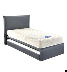 an image of a bed with mattress and headboard