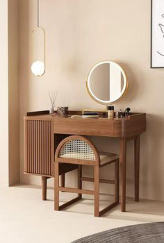 a dressing table with a mirror and stool in a room next to a wall mounted art piece