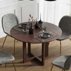 a dining table with four chairs around it