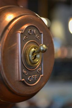 a close up view of the knobs on an old fashioned fire hydrant