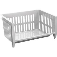 a white plastic baby crib on a white background