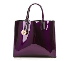 This fabulous patent leather tote can also be used as a cross body for versatility. These bright colors just pop and this handbag can easily transition from day to evening. This one-of-a-kind bag even features enough room to carry an iPad or a magazine. Modern Purple Rectangular Satchel, Modern Rectangular Purple Satchel, Purple Shoulder Bag For Office, Modern Purple Shoulder Bag, Modern Purple Top Handle Shoulder Bag, Purple Satchel Shoulder Bag For Office, Purple Office Bag With Detachable Handle, Purple Top Handle Bag For Office, Purple Office Crossbody Shoulder Bag