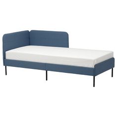 a bed with a blue frame and white sheets