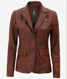 Women's Brown Leather Blazer | Ladies Leather Jacket | Stitches Design Blazer | Premium Leather Blazer | Handmade Leather Blazer | Sizes XS to XXXL Elevate your style with our Women's Brown Leather Blazer, a perfect blend of sophistication and comfort. Crafted from 100% real lambskin leather, this jacket offers a luxurious feel and premium quality, ensuring durability and elegance in every stitch. Featuring a sleek two-button closure and wide notch lapel, this blazer exudes a timeless chic style that is perfect for both casual and formal occasions. With three functional outer pockets and an additional inner pocket, this blazer provides ample space for your essentials, making it ideal for daily commutes or a stylish evening out. The polyester lining ensures comfort and warmth, making this b Brown Leather Blazer, Leather Blazer Women, Custom Leather Jackets, Best Leather Jackets, Leather Blazer Jacket, Blazer Jackets For Women, Brown Blazer, Blazer Designs, Brown Leather Jacket