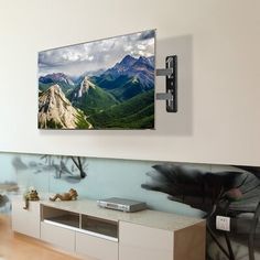 a flat screen tv mounted to the side of a wall