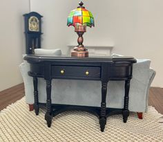 a table with a lamp on top of it