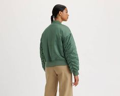 With its bomber jacket look, middle zip-up front, oversized flap pockets and ribbed cuffs and hem, this Andy Tech Jacket will be a mainstay in your closet for years to come. A mid-zip jacket staple Cut with a standard fit Features oversized flap pockets Finished with ribbed cuffs and hem Crafted with warm synthetic fill Tech Jacket, Green Jacket, Zip Jacket, Flap Pocket, Zip Up, Levi's, Zip Ups, Bomber Jacket, Green