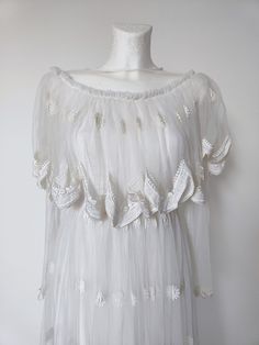 Not sure when it was made, looks like 90s. Very good condition. Lovely lace and ornaments on it.  Measurement taken flat and doubled. bust 80 cm waist 67 cm lenght 144 cm Fairycore Lace Dress For Garden Party, White Vintage Summer Party Dress, Cottagecore Lace Trim Party Dress, Cottagecore Lace Trim Dress For Party, Fairycore Party Dresses With Lace Trim, White Fairycore Dress With Lace Trim, White Vintage Dress For Spring Party, Feminine White Scalloped Lace, White Lace For Spring Party