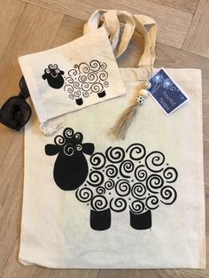 a tote bag with an image of a sheep on it