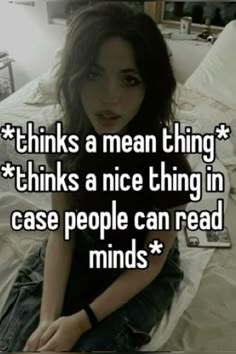 a woman sitting on top of a bed with the words think a mean thing thinks a nice