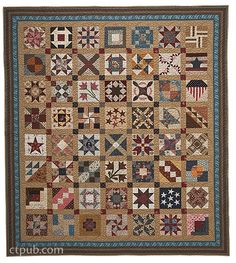 a large quilt with many different designs on the front and back, all in various colors