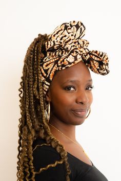 Be unapologetic in our printed head wrap. It’s made from 100% African wax print cotton which makes it lightweight, making it is easy to wrap and great to wear all year round. Our printed head wraps are great for all hair types from afros, short hair, locs, braids, and every other style you can think of. Unlike our jersey head wraps, our printed head wraps has no stretch but will soften after washing. Dimensions: 35cm x 175cm All cotton. Handmade with love.