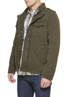 In a washed cotton canvas, this jacket by Levi's features a jersey knit hood and a sherpa lining for a warm, comfortable feel. | Levi's Men's Military Trucker Jacket, X-Large Cotton Hooded Jacket With Pockets For Cold Weather, Utility Cotton Hoodie For Winter, Urban Washed Hooded Jacket For Winter, Winter Utility Cotton Hoodie, Utility Style Cotton Hoodie For Winter, Urban Winter Washed Hooded Jacket, Winter Cotton Utility Jacket For Streetwear, Cotton Parka With Detachable Hood For Fall, Fall Cotton Parka With Detachable Hood