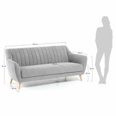 an image of a couch with measurements for it