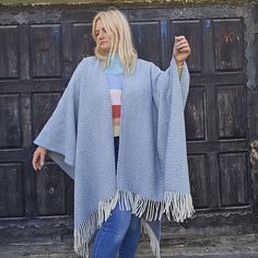 Timeless and versatile  poncho for freely moving is made from merino wool  Ideal for all seasons.  This is  extra warm poncho looks fantastic in the town or country  COMPOSITION: 80% merino wool 20% nylon (for extra durability) Measurements are as follows:  55  inches in width (or 140cm) and  39 inches  (100cm) in length (including the fringes).  They are One size fits most. CARE INSTRUCTIONS: dry clean or hand wash in cold water. An excellent wool poncho for indoor and outdoor use. Protects aga Ruana Wrap, Cape Shawl, Wool Poncho, Wool Cape, Natural Material, Shawls And Wraps, Natural Wool, Fashion Item, Scarf Wrap