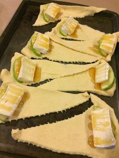 several pieces of food are arranged on a baking sheet