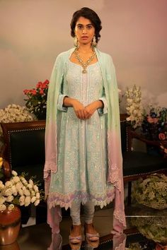 Light blue floral chikankari embroidered anarkali with sequin detail. Paired with ombre dupatta and pant.
Component: 3
Pattern: Hand embroidered
Type Of Work: Chikankari, Stone work, Sequins, Bead work
Neckline: V neck
Sleeve Type: Full sleeves
Fabric: Georgette
Color: Blue
Other Details: 
Scallop dupatta
Bead, sequins and stone work anarkali
Occasion: Mehendi, Haldi - Aza Fashions V Neck Anarkali, Ombre Dupatta, Scallop Dupatta, Chikankari Anarkali, Blue Anarkali, Embroidered Anarkali, Indian Fashion Designers, Anarkali Suits, Versatile Outfits