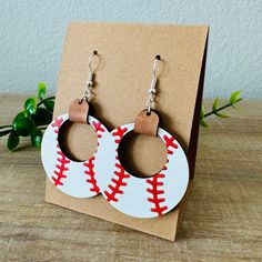 Knock it out of the park with these wood and leather baseball hoop earrings. Hand painted and made to order. Featuring metal findings and leather accents. measuring 2.5” from top of finding to the bottom of the earring and 1.5” wide Baseball Earrings Cricut, School Spirit Earrings Diy, Wooden Earrings Diy, Sport Earrings, Hand Painted Earrings Wood, Yellow Lighting, Sports Earrings, Cricut Earrings, Cricket Crafts