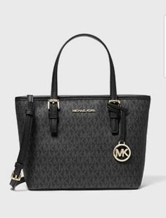 Michael Kors Jet Set Travel Extra Small Logo Top-Zip Tote Bag NEW WITH TAG. 🌷. 🌷 100% Buyer Satisfaction. 🌷 100% AUTHENTIC 🌷 Color: BLACK 🌷 DESIGN:       Compact yet practical, The Michael Kors Jet set Tote Bag is the ideal daily  companion . Logo-print canvas and a polished Charm make a Lux statement , while a Top-Zip Fastening ensures your belongings  will stay in place. Carry it CROSSBODY for days that require On-the-go hands free. 🌷 Details:       - Tote bag.       -  Logo-print Canvas New Jet, Mk Purse, Brown Crossbody Bag, Carryall Tote, Nylon Tote Bags, Travel Tote Bag, Brown Tote, Zip Tote, Black Leather Tote