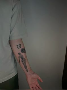 a person with a tattoo on their arm